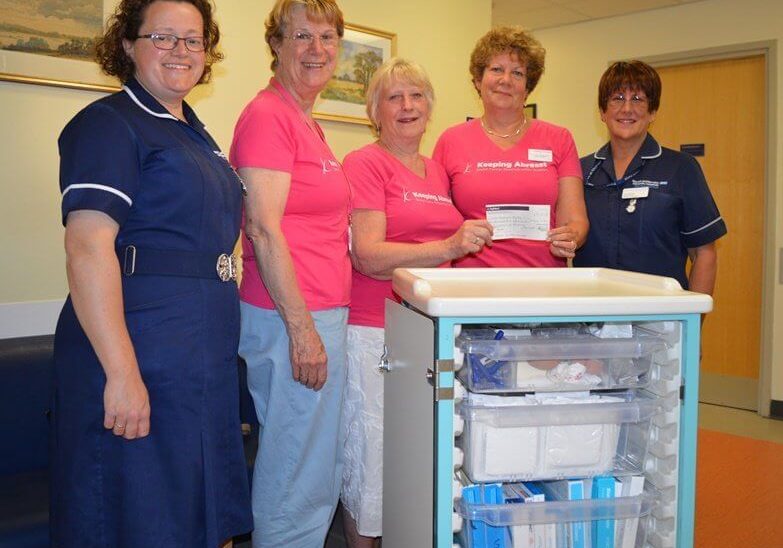 Handover of cheque for trolleys